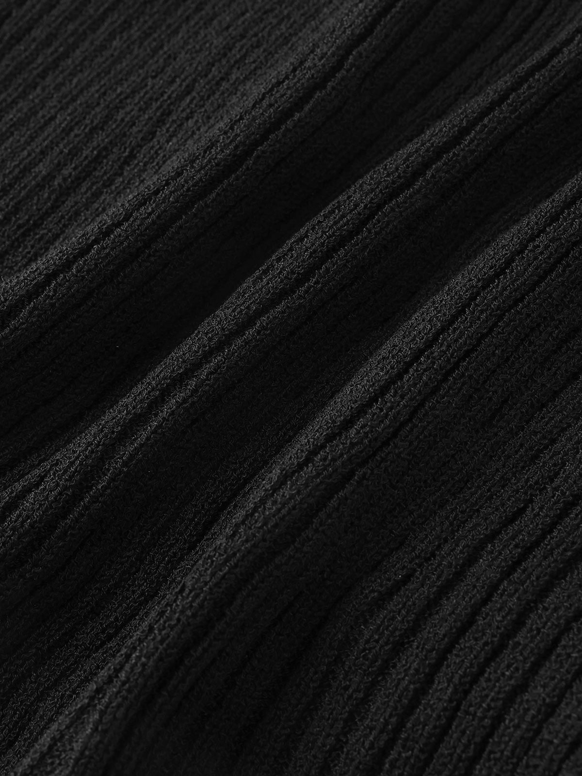 Open The book to Find a Knit  Skirt – Jet Black.