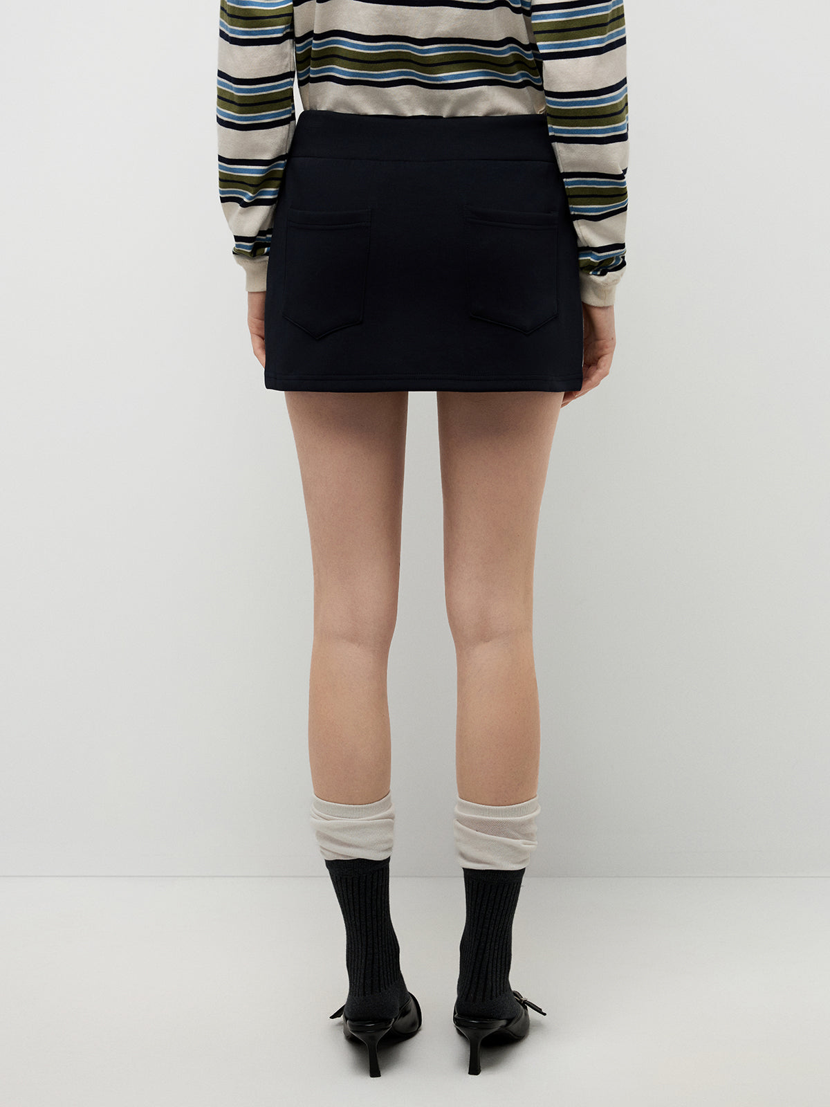 Twirl Knot Mini Skirt – Black Ivory