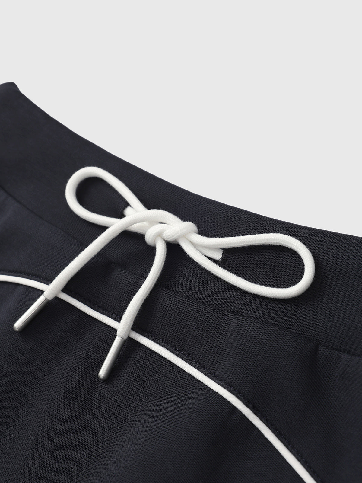 Twirl Knot Mini Skirt – Black Ivory