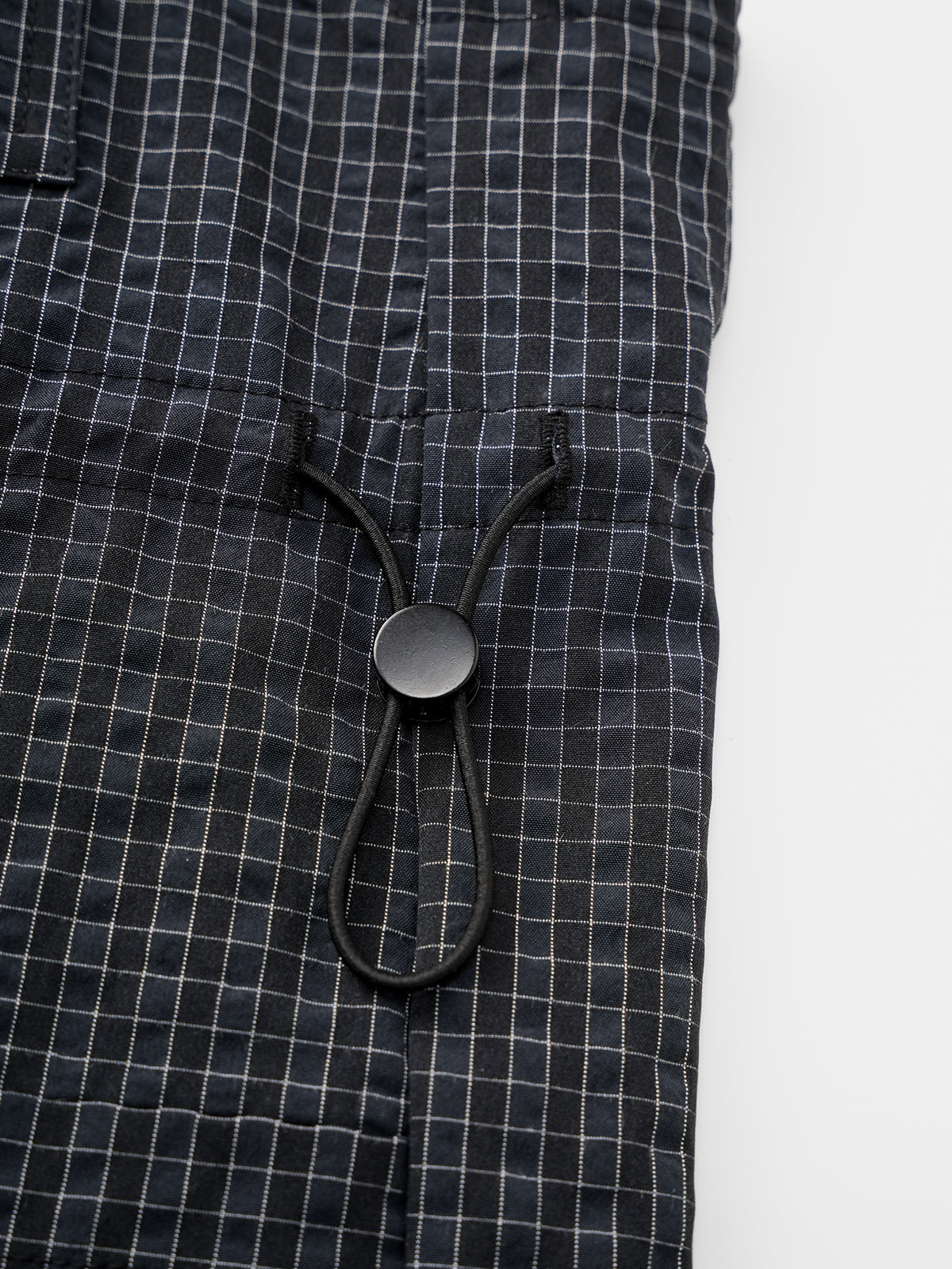Trench-Strap Jumpsuit - Checkered Shield