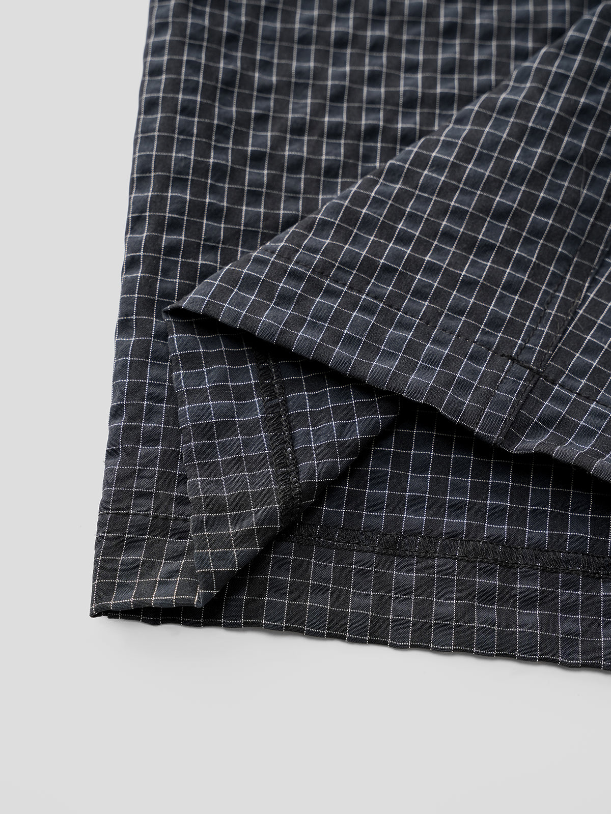 Trench-Strap Jumpsuit - Checkered Shield