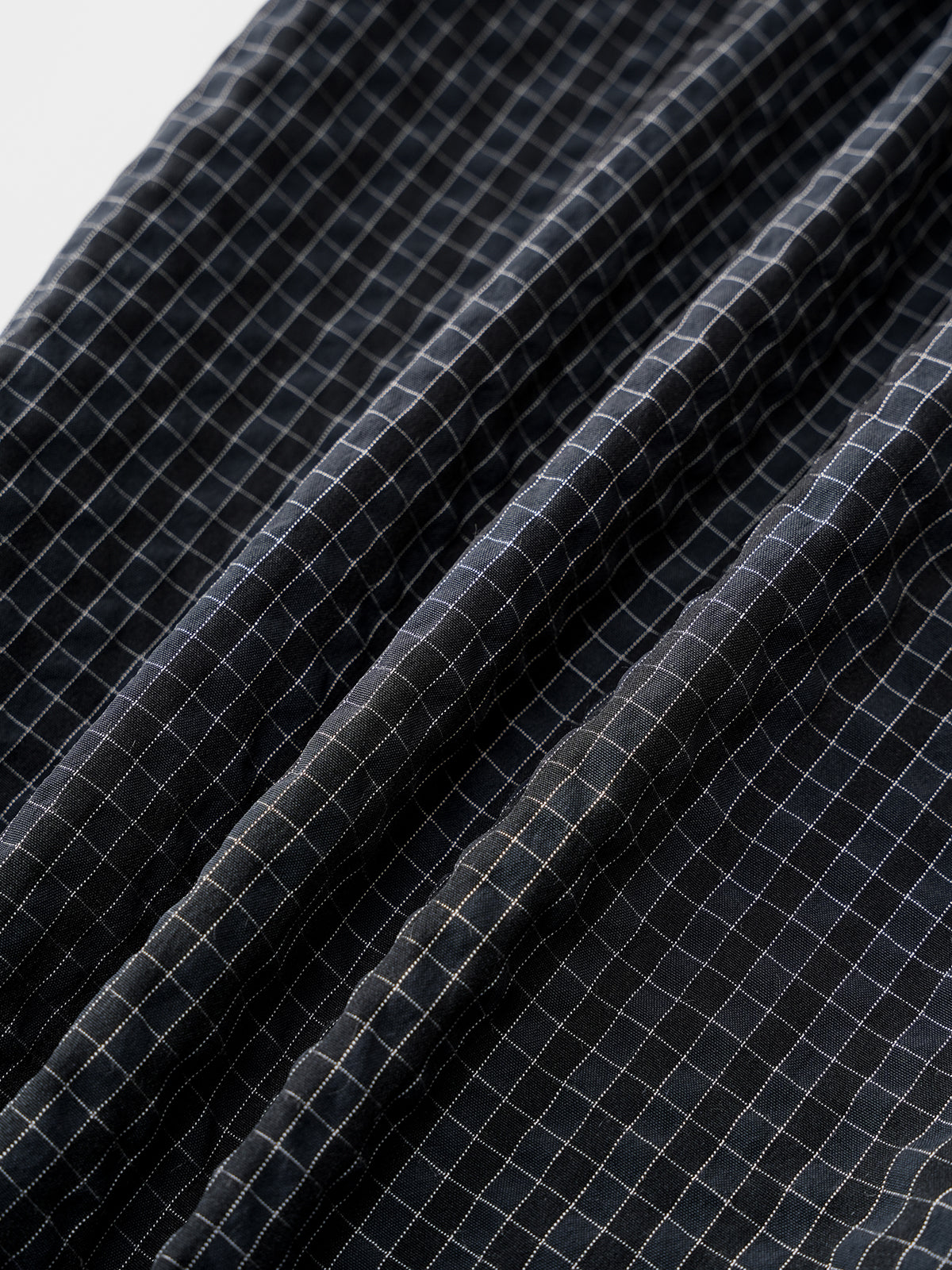 Trench-Strap Jumpsuit - Checkered Shield