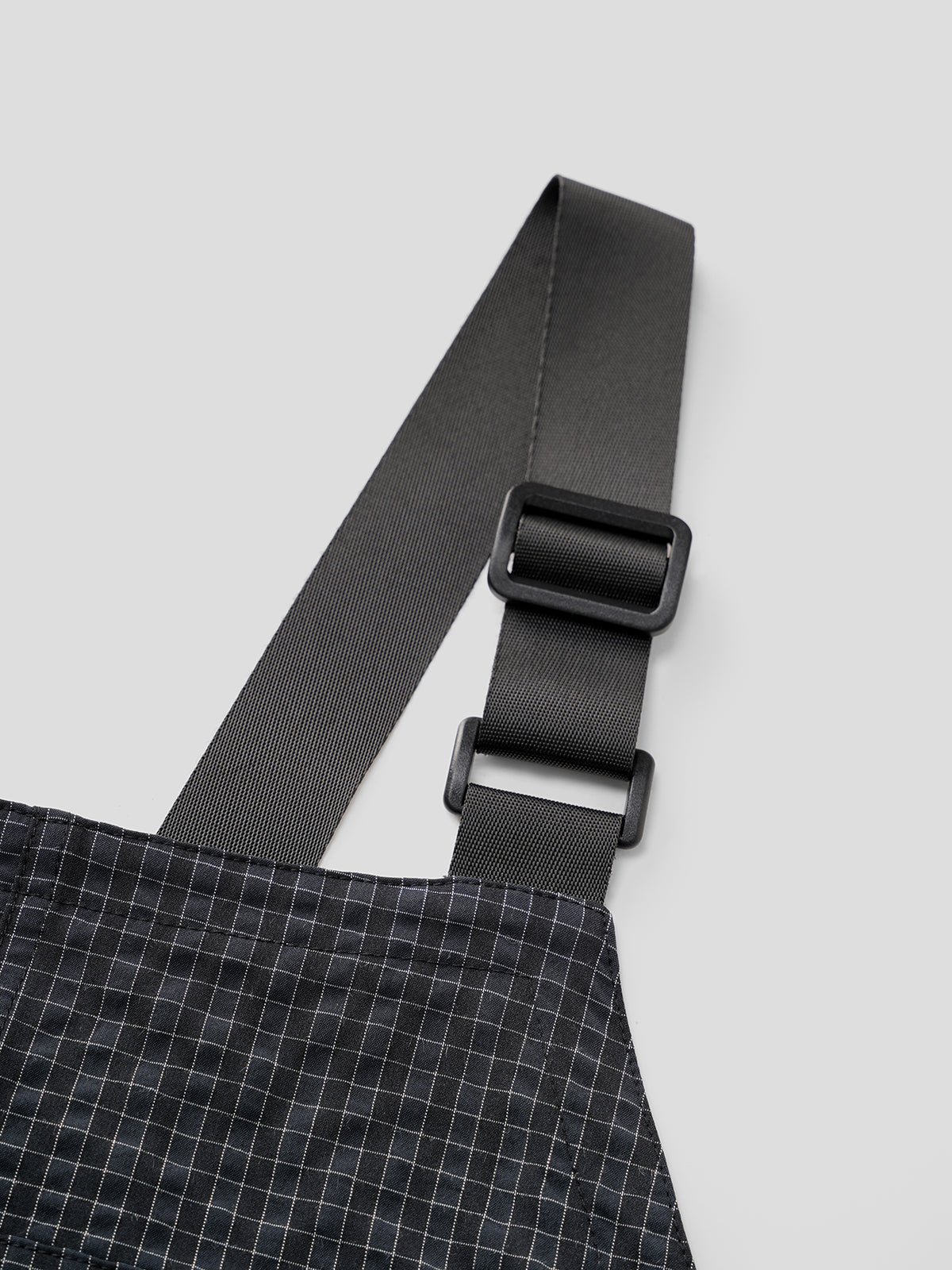 Trench-Strap Jumpsuit - Checkered Shield