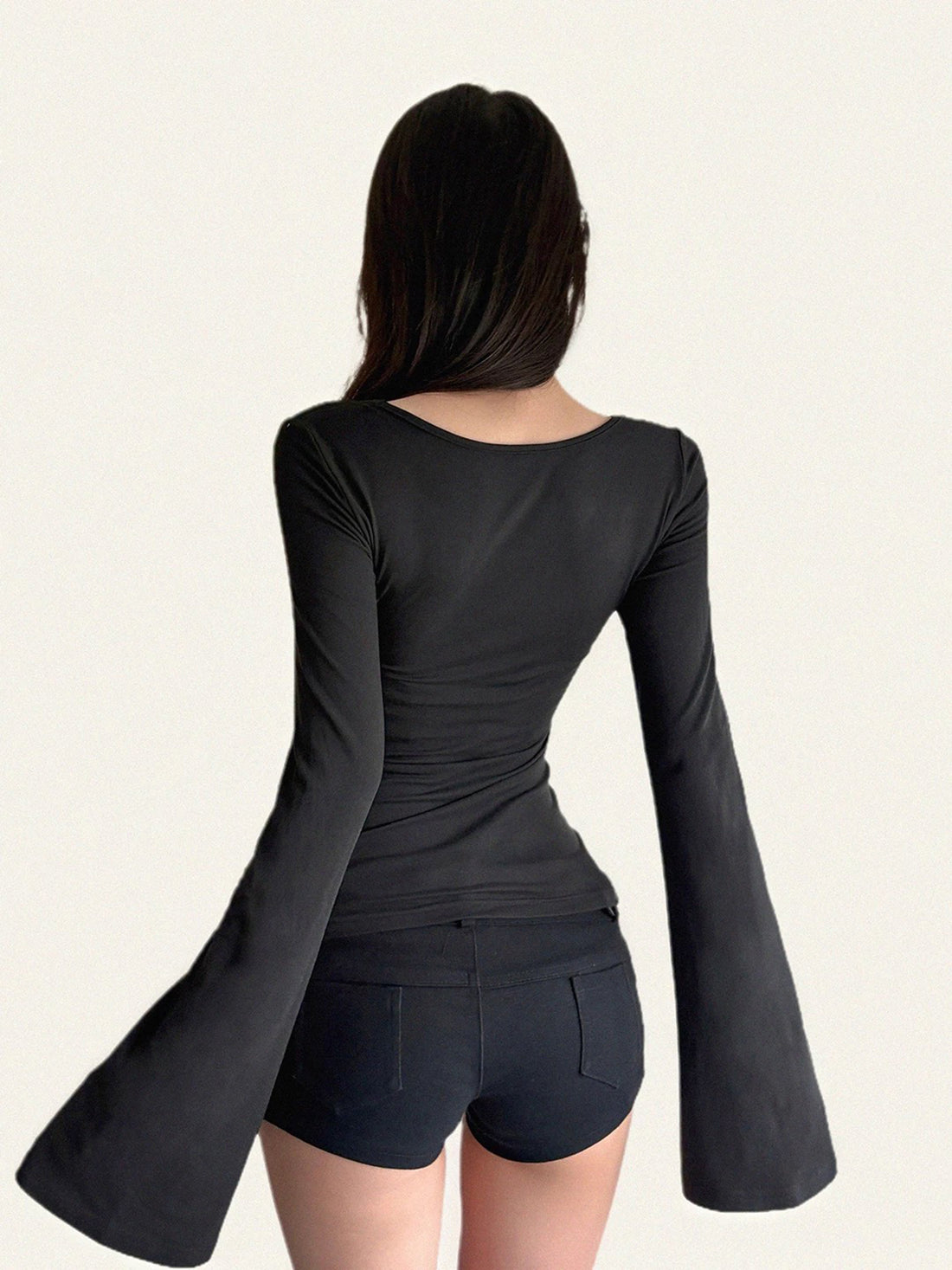 Brick Lane Skimming Bell Sleeve Metal Eyelet Top - Black