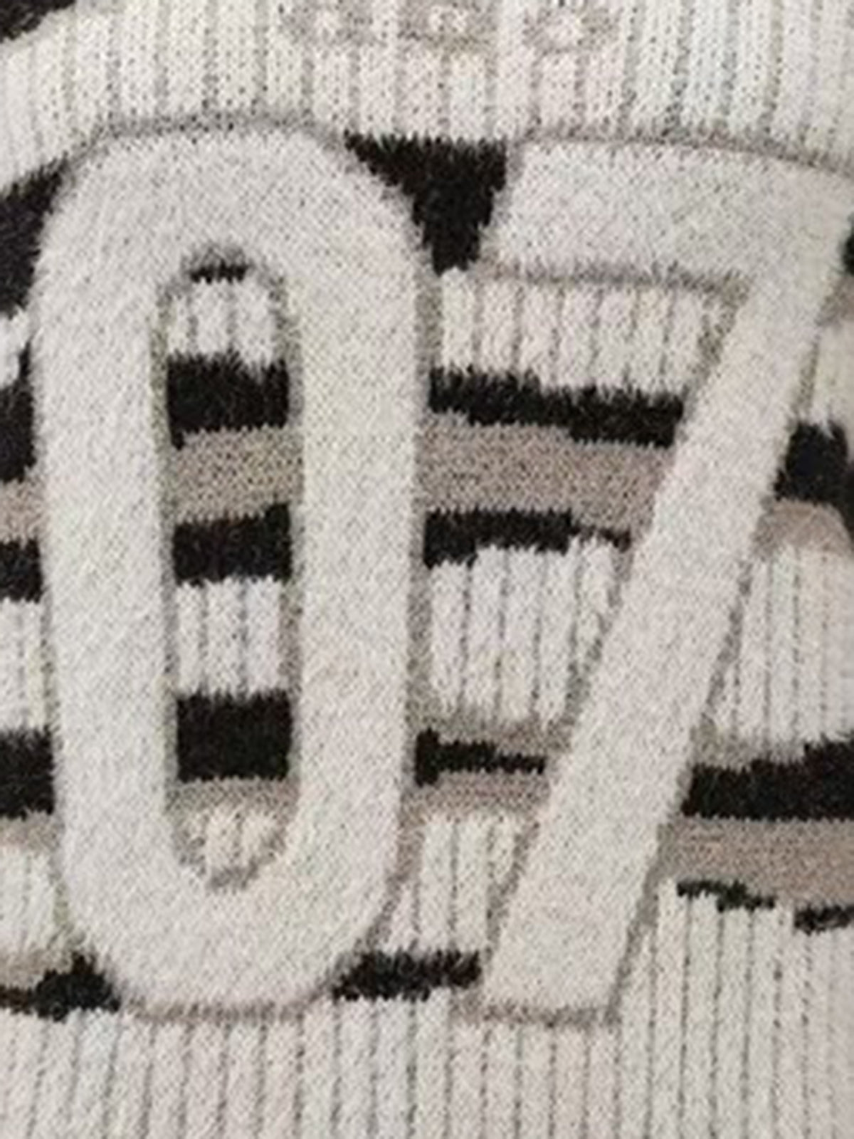 Shoulder Signal Sweater – Black Cream